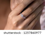 Diamond engagement ring on hand 