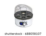 Small photo of Electric egg boiler, cooker isolated on white background.