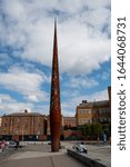 Small photo of Gloucester, United Kingdom - September 08 2019: The 22 Metre high beacon steel sculpture by Wolfgang Butress in Gloucester Docks