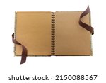 Small photo of Open blank scrapbook, journal, guestbook made from craft paper with brown ribbon isolated on white background