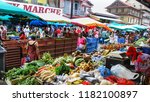 Small photo of Cayenne/French Guiana - 03.19.2016: The Farmer's market close to the town marina. French word "marche" means market.