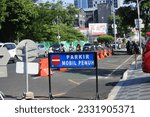 Small photo of Surabaya, Indonesia - June 24, 2023 - The information board on the side of the road prohibits entry because the parking area is inside wholly.