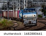 Small photo of Osaka, Japan - October 06, 2019 : Japan Freight Railway Company (JRF) Locomotive EF66-117 of freight train passing Kishibe Station in Suite, Osaka, Japan