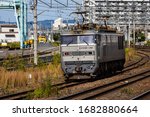 Small photo of Osaka, Japan - October 06, 2019 : Japan Freight Railway Company (JRF) Locomotive EF510-510 run around Kishibe Station in Suite, Osaka, Japan