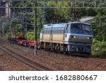 Small photo of Kyoto, Japan - October 05, 2019 : Japan Freight Railway Company (JRF) Locomotive EF66-111 of short freight train passing Yamazaki Station in Oyamazaki, Kyoto, Japan