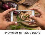 Two hand take the food photo with smartphone
