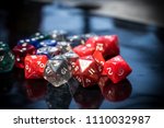Small photo of A set of colorful RPG dice on a black table