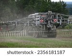 Small photo of Stadthagen, Germany - September 2, 2023: Slurry spreading on a field