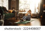 Small photo of Portrait of a Beautiful Athletic Asian Woman Does ABS Crunches Exercises, Workout, Yoga, Stretching, Training at Home. Sunny Apartment with Positive Smiling Healthy Woman Staying Mindful.