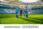 Small photo of Soccer Team Training on Stadium: Coach Calls Players to Discuss Football Game Strategy and Tactics. Trainer Leads Athletes to Victory, Preparing For Championship, Encouraging Sportsmen. Workout Plan