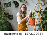 Young Woman Gardener In Glasses ...