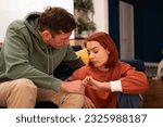 Small photo of Difficult family conversation, crisis relations, distrust, establishment trusting relationships, after quarrel, tries understanding, offer go family psychologist. Husband and wife support each other