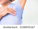 Small photo of Hyperhidrosis Sweet Arm with Blue Clothes Shirt, Problem Under Hand Sweaty Woman, Health Person Body Hygiene Heat Hygienic Deodorant Sweating Wet Armpic embarrassment Stain Patch Hot Smelling.