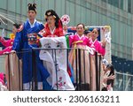Small photo of Korean participants march down Sixth Avenue during the Asian American and Pacific Islander Cultural and Heritage Parade in New York City, on May 21, 2023.
