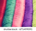 stack of colorful clothes | Shutterstock . vector #671499091