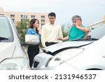 Small photo of The concept of car insurance. car accident on road The man and woman whose car was damaged quarreled with the fat man to file an insurance claim and claim damages.