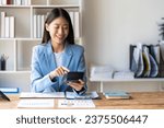 Small photo of Asian accountants meeting doing accounts payable, assets, capital book value, inventory, liabilities, cost of goods sold. vertical picture