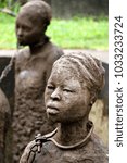 Small photo of STONE TOWN, ZANZIBAR - 9 APRIL 2016: Sculpture of slaves dedicated to victims of slavery in Stone Town. Stone Town was one of the world's last slave markets, run by Arab traders until 1873. Editorial.