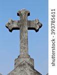 A Gritty  Grey Stone Cross In A ...