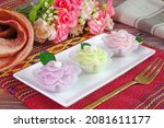 Small photo of Chor Keaw Auspicious Thai dessert for wedding ceremony party and all Thai festival. Flower-shaped Thai sweetmeat, selective focus