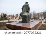 Small photo of Comrat, Moldova - November 8, 2014: Rear view of the monument to Vladimir Ilyich Ulyanov (more precisely, his pseudonym Lenin) in the city center.