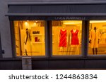 Small photo of Bruges, Belgium - 17 February 2018: Mannequin with red dress at Linea Raffaelli shop at Bruges, Belgium