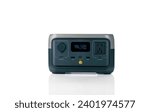 Small photo of Portable power station or power box isolated on white background. On-the-Go energy solution. Power supply for outdoor adventure. Compact portable power box with a rechargeable lithium-ion battery.