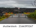 Small photo of Roadblock in front of a lava flow of the Fissure 8 covering a road in the Leilani Estates near Hilo in the southeast of Big Island, Hawaii, USA