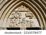 Small photo of Tympanum of the Collegiate Church of Our Lady of the Assumption in the rural town of Crecy la Chapelle in the French department of Seine et Marne in Paris Region