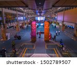 Small photo of Vancouver, Canada - september 14, 2018: Panoramic view of a pair of huge wooden totems guarding the entrance of all tourists at Vancouver International Airport