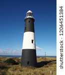 Small photo of Black and white lighthouse on Spurn Point, East Yorkshire, England