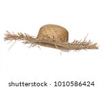 Vintage straw beach hat hat, isolated on white background.  Side view. Tilted up a little, showing the interior.