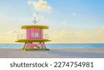 Small photo of Lifeguard hut on the beach in Miami Florida, colorful hut on the beach during sunrise Miami South Beach. Sunny day on the beach