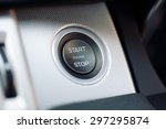 Engine start and stop button on electric hybrid car dashboard