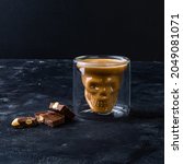 scull glass with coffee and... | Shutterstock . vector #2049081071