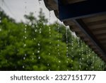 Close-up of raindrops on the roof in the rainy season.