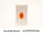Small photo of the front backpage/ box of Iphone 5 SE shows it's golden rose color. Shot in December 2018 in Cairo - Egypt
