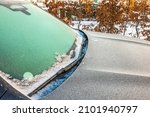 Beautiful view of texture on frozen car windshield on winter frosty day. Sweden.