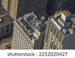 Small photo of Beautiful view of with 86th floor of Empire State Building in Manhattan on rest zone on roof of building on bright day. Manhattan. New York. USA. 09.21.2022.