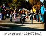 Small photo of Ogunquit, Maine USA: October 21st 2018: young kids compete in the Ogunquit High Heel Dash to benefit the Frannie Peabody Center.