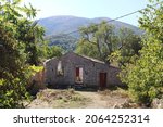 Small photo of Abandoned house in Palea Perithia, the oldest village on the Greek island Corfu.