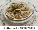 Dumplings with buckwheat porridge and fried onions. This is a very popular food in Poland. Homemade food