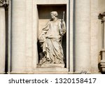 Small photo of Italy / Rome – September 22, 2009: the Trevi Fountain is the largest and most famous fountain in Rome. Details of allegorical sculpture “Salubrity” by Filippo Valle