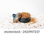 Small photo of Raw Buckwheat Pile, Dry Buck Wheat Grains, Uncooked Buckwheat, Bowl with raw uncooked buckwheat