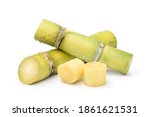 Fresh sugar cane with water droplets and sliced isolated on white background.
