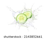 Cucumber slices with water splashing isolated on white background.