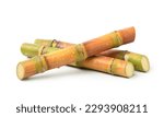 Small photo of Fresh sugar cane stalk with water droplets isolated on white background. Clipping path.