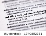 Small photo of Blurred close up to the partial dictionary definition of Ad-lib