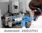 Technician preparing chemical radioactive contrast agent medicine for radiology and nuclear medicine and molecular imaging	