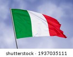 Italy flag isolated on sky...